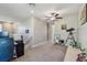 Upstairs bonus room with carpet flooring and a view to the hallway at 12775 Maple Bonsai Dr, Riverview, FL 33579