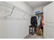 Walk-in closet with wire shelving, carpet, and ample storage space at 12775 Maple Bonsai Dr, Riverview, FL 33579