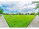 Lush green community park with picnic areas and covered gazebos, ideal for outdoor gatherings and relaxation at 12775 Maple Bonsai Dr, Riverview, FL 33579