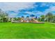 Vibrant community playground with multiple slides and climbing structures, providing a fun and safe recreational area at 12775 Maple Bonsai Dr, Riverview, FL 33579