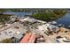 Wide aerial view of a waterfront area with restaurants, boat docks, and various marine services at 1285 Salt Lake Dr, Tarpon Springs, FL 34689
