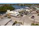 Aerial shot of a seafood restaurant, parking lot, and nearby riverfront at 1285 Salt Lake Dr, Tarpon Springs, FL 34689