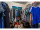 Walk-in closet with ample hanging space, wire shelving, and visible storage solutions at 1285 Salt Lake Dr, Tarpon Springs, FL 34689