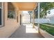 Covered patio offers views to screen enclosed area at 1285 Salt Lake Dr, Tarpon Springs, FL 34689