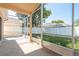 Enclosed patio with screened enclosure overlooks the backyard at 1285 Salt Lake Dr, Tarpon Springs, FL 34689