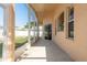 View of a covered patio showcasing ample space and natural light at 1285 Salt Lake Dr, Tarpon Springs, FL 34689
