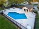 Beautiful community pool with ample seating, sun loungers, and a covered pavilion, perfect for relaxation and gatherings at 16819 Stanza Ct, Tampa, FL 33624