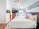 Main bedroom with a view to the bathroom featuring closet and window views at 16819 Stanza Ct, Tampa, FL 33624