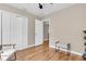 Bedroom featuring hardwood floors, white trim, and closet for storage at 1736 23Rd N Ave, St Petersburg, FL 33710