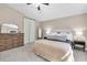 Cozy bedroom features neutral walls, plush carpet, and warm, inviting decor at 1736 23Rd N Ave, St Petersburg, FL 33710