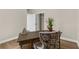 Office area featuring a desk, chair, hardwood floors and a light-toned wall at 17917 Machair Ln, Land O Lakes, FL 34638