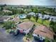 Exterior aerial showcases building's parking and surrounding landscape at 1821 Bough Ave # 4, Clearwater, FL 33760