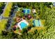 High angle view of community amenities including a pool, tennis courts, and basketball courts at 2256 Pantucket Dr, Wesley Chapel, FL 33543