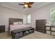 Bedroom with a ceiling fan, a large bed, and matching furniture, creating a comfortable retreat at 2256 Pantucket Dr, Wesley Chapel, FL 33543