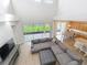 Bright living room features a soaring ceiling, modern design, and lots of natural light at 2256 Pantucket Dr, Wesley Chapel, FL 33543
