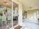 Covered patio offering great views into the kitchen and living room through sliding glass doors at 2256 Pantucket Dr, Wesley Chapel, FL 33543