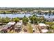 Aerial view of vacant lot near waterfront homes, perfect for building your dream home at 2314 N Riverside Dr, Tampa, FL 33602