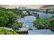 An aerial view of the property, showing the home, waterfront, and the nearby downtown skyline at 2314 N Riverside Dr, Tampa, FL 33602