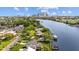 An aerial view of waterfront homes along a canal with city views at 2314 N Riverside Dr, Tampa, FL 33602