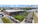 Tampa Armature Works features green space, palm trees, and convenient street access at 2314 N Riverside Dr, Tampa, FL 33602