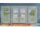 Balcony access through french doors with view of the marina at 2314 N Riverside Dr, Tampa, FL 33602