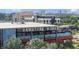 A commercial building with the words 'Armature Works' prominently displayed on the front of the building at 2314 N Riverside Dr, Tampa, FL 33602