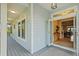 Open entryway featuring a view into the spacious living area, with access to the outdoor porch at 2314 N Riverside Dr, Tampa, FL 33602