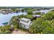 Two story waterfront home surrounded by lush trees at 2314 N Riverside Dr, Tampa, FL 33602