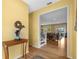 Inviting foyer with hardwood floors and a view into the open living space, perfect for entertaining guests at 2314 N Riverside Dr, Tampa, FL 33602