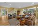 Open concept living room with hardwood floors and comfortable seating area at 2314 N Riverside Dr, Tampa, FL 33602