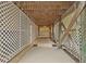 Enclosed space under the home offering storage, concrete flooring, and access to the upper levels at 2314 N Riverside Dr, Tampa, FL 33602