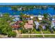 Real estate showcasing verdant landscaping and a tranquil waterfront at 2421 Brevard Ne Rd, St Petersburg, FL 33704