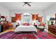 Bright and inviting bedroom with decorative rugs, ample closet space, and great natural light at 2421 Brevard Ne Rd, St Petersburg, FL 33704