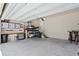 Spacious garage featuring workspace and shelving at 2421 Brevard Ne Rd, St Petersburg, FL 33704