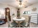 Charming dining room featuring decorative details, plenty of space and modern lighting at 2555 Royal Pines Cir # A, Clearwater, FL 33763