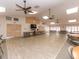 Spacious meeting room with tables, chairs and an abundance of light at 2555 Royal Pines Cir # A, Clearwater, FL 33763
