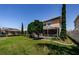 Large yard with screened-in lanai offers privacy and outdoor living space at 2629 Timacqua Dr, Holiday, FL 34691