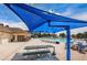 Relax in a covered poolside seating area, next to the clubhouse with ample seating at 2629 Timacqua Dr, Holiday, FL 34691