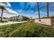 Key Vista community sign with lush landscaping at the gated entrance at 2629 Timacqua Dr, Holiday, FL 34691
