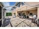 Large screened-in lanai with dining, cooking, and seating areas, perfect for gatherings at 2629 Timacqua Dr, Holiday, FL 34691