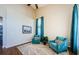 Cozy living room with vaulted ceiling, stylish decor, and comfortable seating at 2629 Timacqua Dr, Holiday, FL 34691