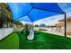 Community playground featuring a slide, jungle gym, and bike rack with a shaded picnic area at 2629 Timacqua Dr, Holiday, FL 34691