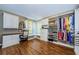 Spacious walk-in closet with custom built-ins and plenty of shelving and hanging space at 2629 Timacqua Dr, Holiday, FL 34691