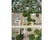 Aerial view of a property featuring mature trees and defined property lines within a residential neighborhood at 2805 Olavet Ct, Valrico, FL 33596