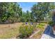 Lush backyard featuring a cozy seating area, perfect for enjoying the outdoors at 2805 Olavet Ct, Valrico, FL 33596