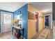 Entryway features warm lighting and hardwood floors at 2805 Olavet Ct, Valrico, FL 33596