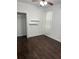 Bright bedroom featuring hardwood flooring, a ceiling fan and closet at 2903 N 16Th St, Tampa, FL 33605