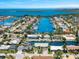 An aerial view of the beautiful waterfront community with gorgeous waterways and boat docks at 3505 Seaway Dr, New Port Richey, FL 34652