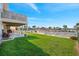 Lush green lawn and a view of the canal and boat docks creating a tranquil outdoor space at 3505 Seaway Dr, New Port Richey, FL 34652