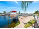 Private boat dock with a boat lift, providing convenient access to the water and stunning waterfront views at 3505 Seaway Dr, New Port Richey, FL 34652